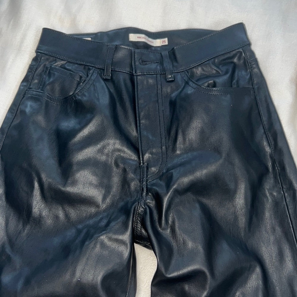 Black, faux, leather pants, Levi’s, size 25.